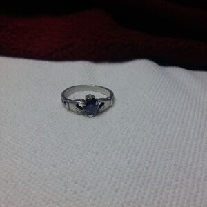 Amethyst and CZ holding hands ring